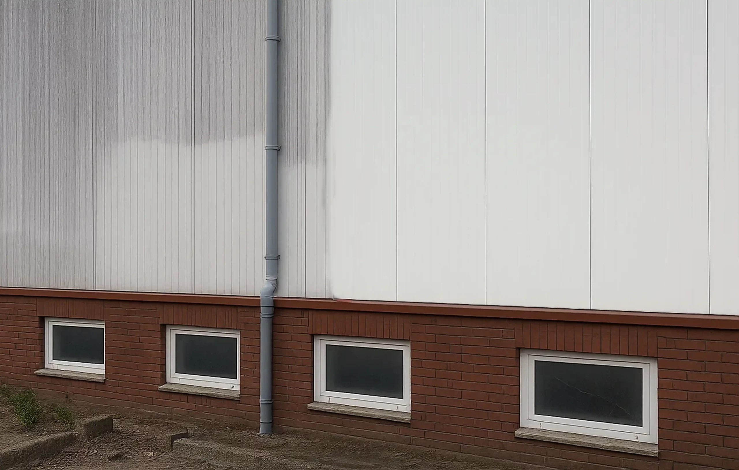 reinigen van een warehouse gevel